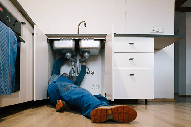 Professional Drain Cleaning technician working in Rossville, GA